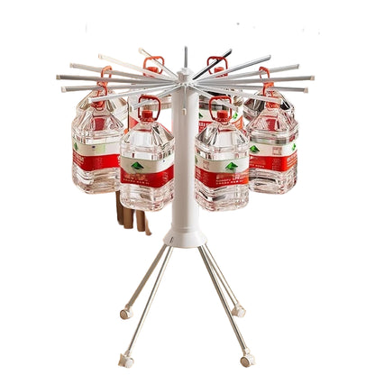 Drying rack with four bottles on a wooden floor near a window, with text about strong load-bearing capacity for home use.