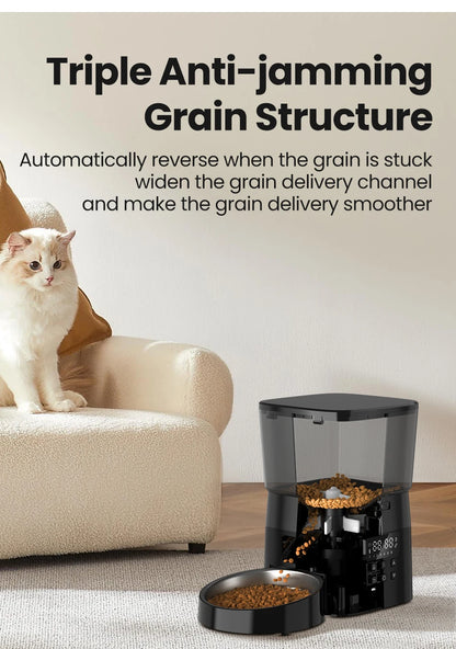 Cat sitting on a couch next to an automatic pet feeder with text about its anti-jamming feature.