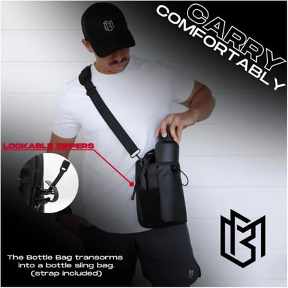 Person holding a black bottle bag with lockable zippers, featuring the brand 'CARRY COMFORTABLY'.