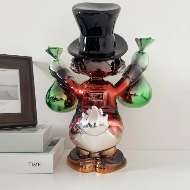 Decorative figurine with a top hat and colorful body on a white surface.